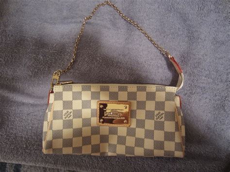 fake louis vuitton wristlet clutch